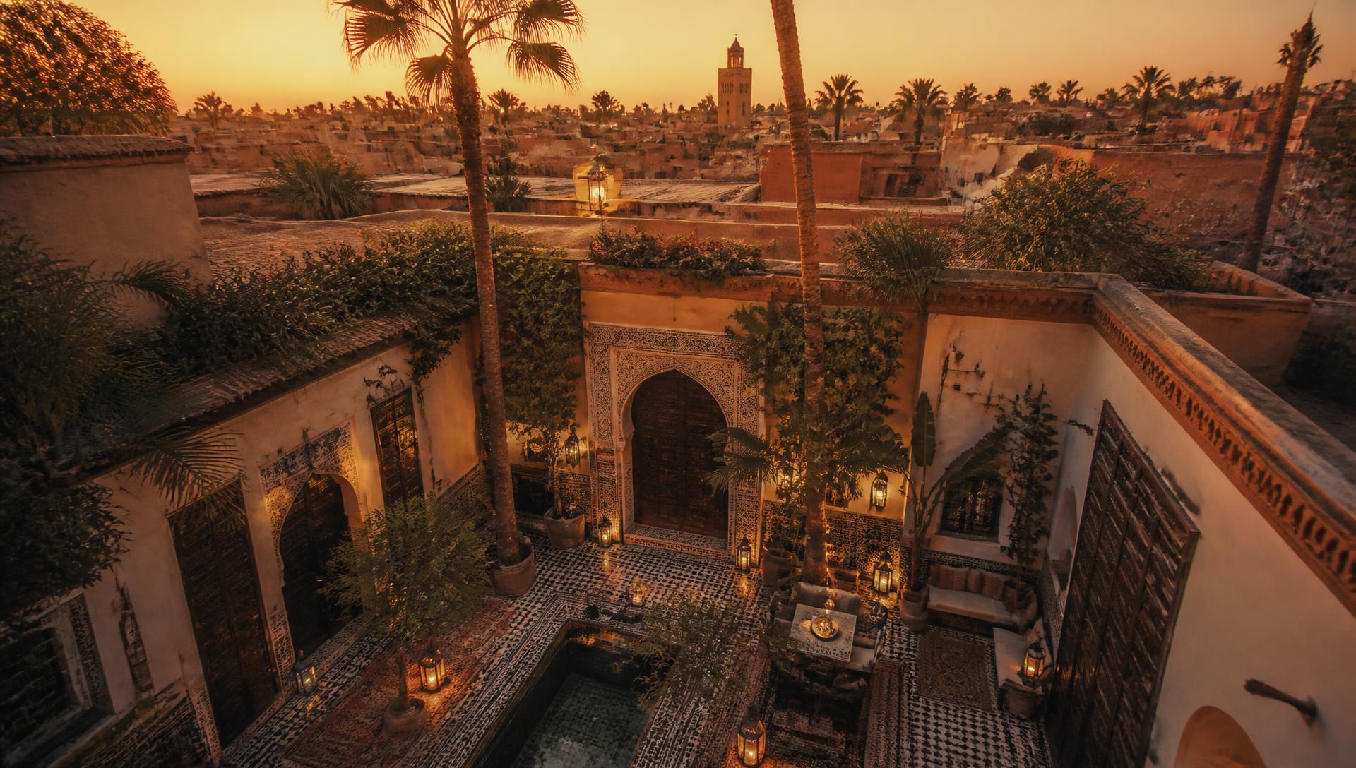 Golden hour over a Moroccan riad courtyard in Marrakech